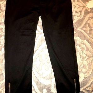 Black pants with zipper at the bottom